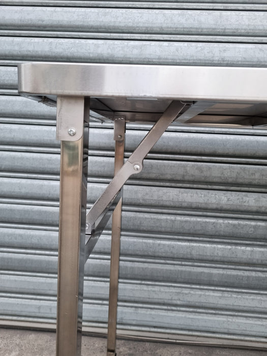 Folding table in 304 stainless steel close up of leg